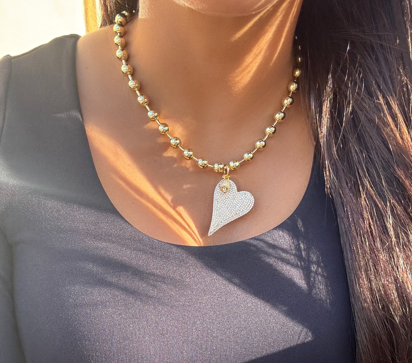 Golden heart goose necklace