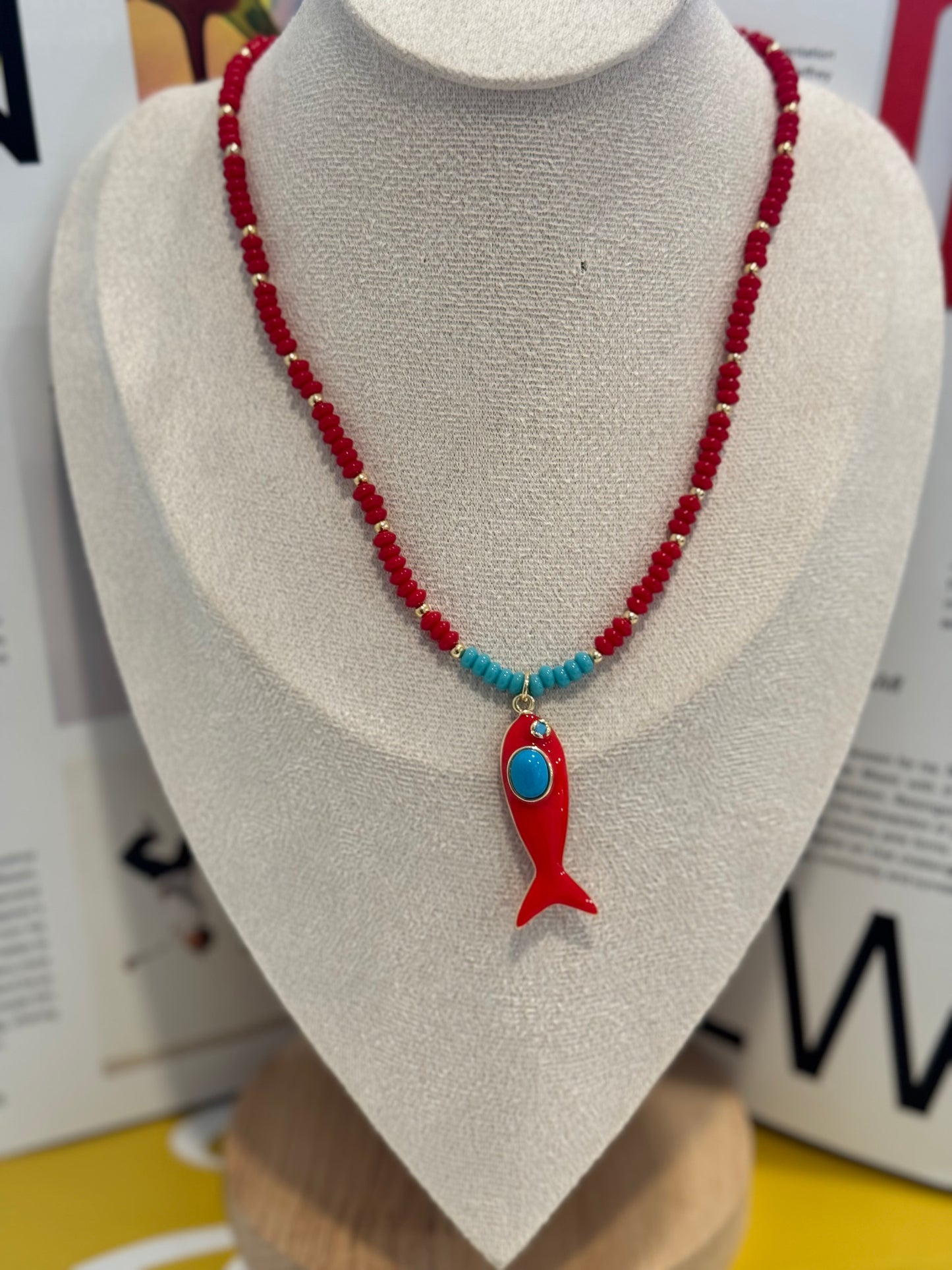 Red kap fish necklace