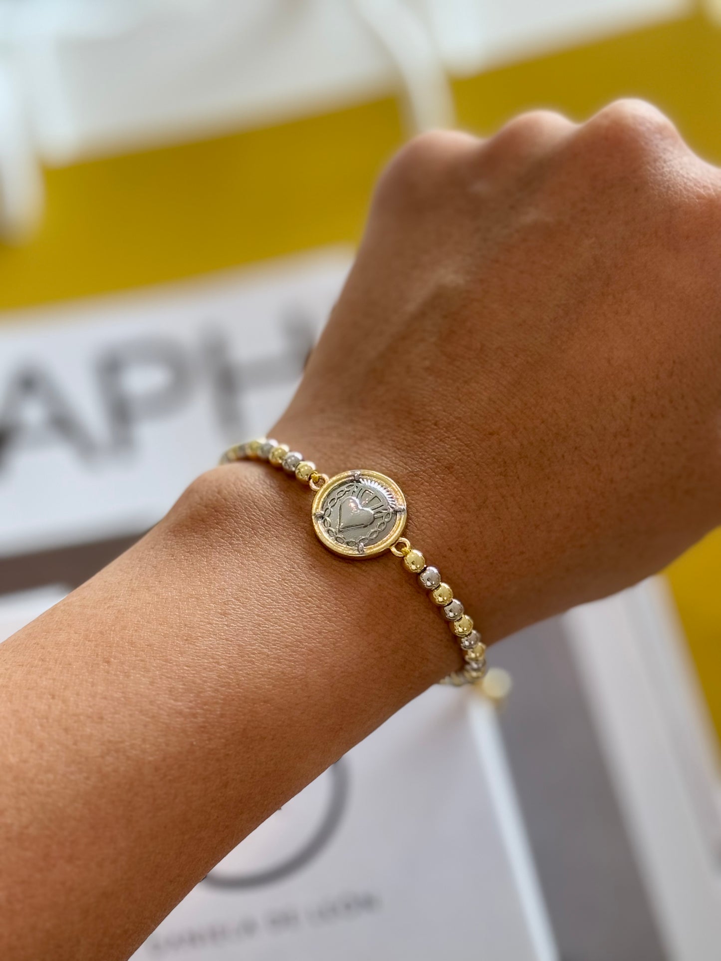 Tiny two tone connector adjustable bracelet