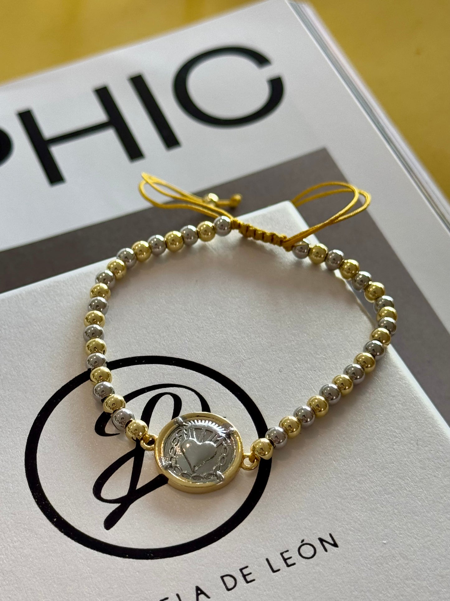 Tiny two tone connector adjustable bracelet
