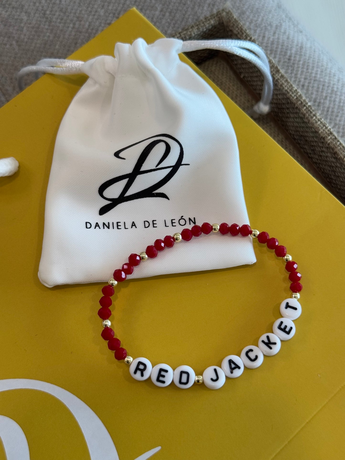 Red Jacket Elastic Bracelet - Postcard Included